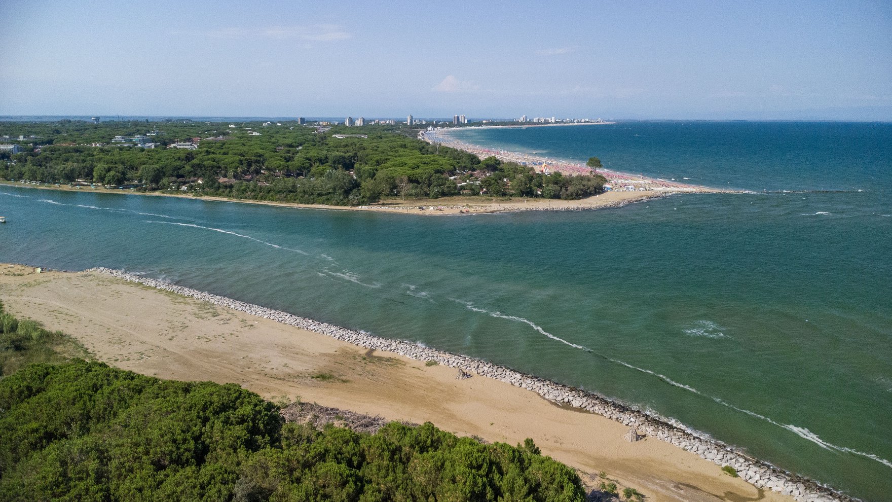 Aerial view of the Tagliamento river meeting the sea.